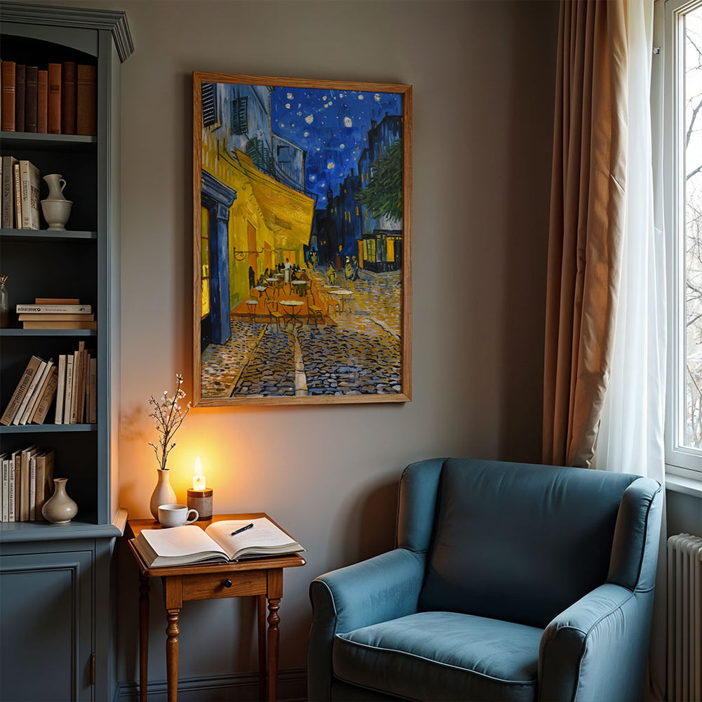 Café Terrace at Night framed and glowing in a reading nook with a velvet chair and warm lighting.