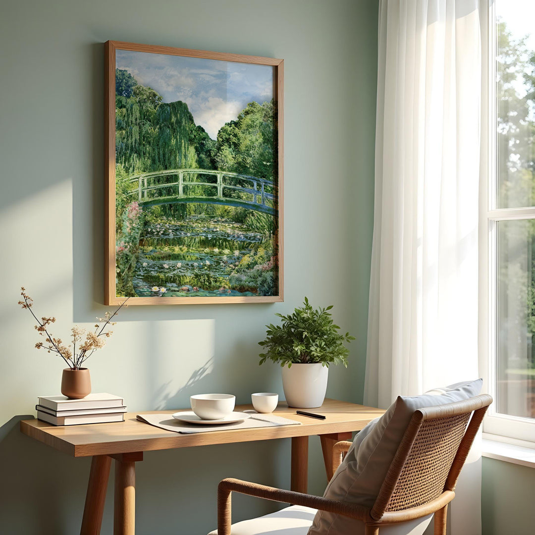 Claude Monet The Japanese Bridge framed and styled in a peaceful workspace with natural light and green plants.