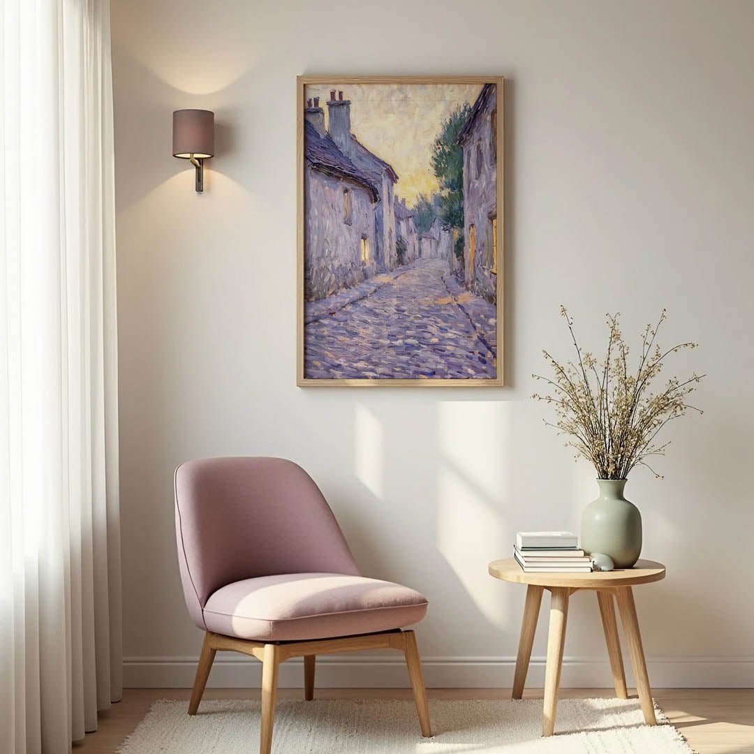 Claude Monet twilight village painting in a natural wood frame, capturing a quiet cobblestone street bathed in soft evening light for timeless interior charm.