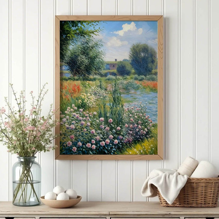 Claude Monet inspired garden painting in a natural wood frame, featuring a lush riverside scene filled with flowers and impressionist textures.